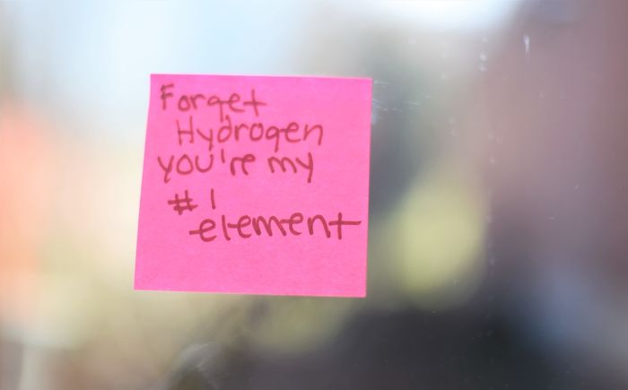 A Post-It note in a breezeway at Penn State Behrend