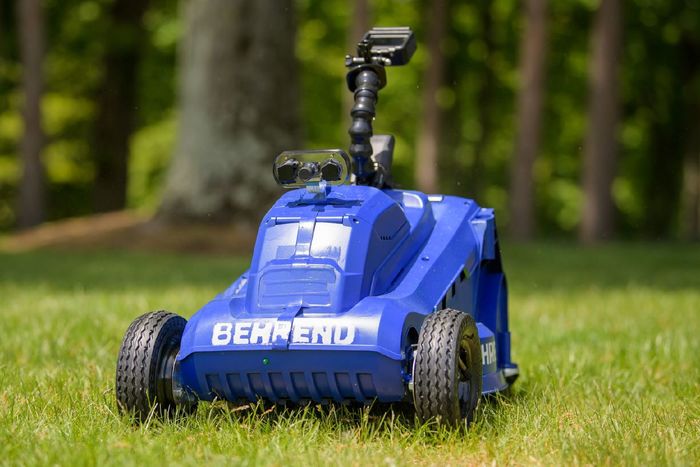 A close-up of the front of a remote-control lawn mower built by students at Penn State Behrend