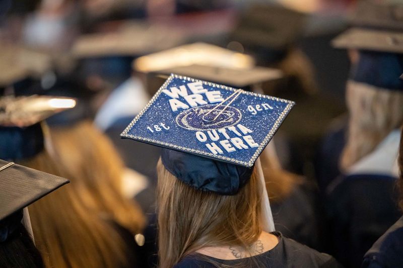 A student shows off her mortarboard cap during Penn State Behrend's spring 2023 commencement ceremony.