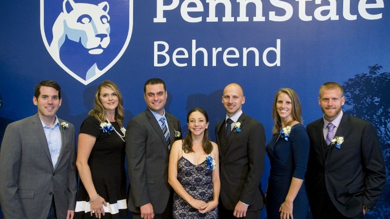 A group photo of former student-athletes being inducted into the Penn State Behrend Athletics Hall of Fame.