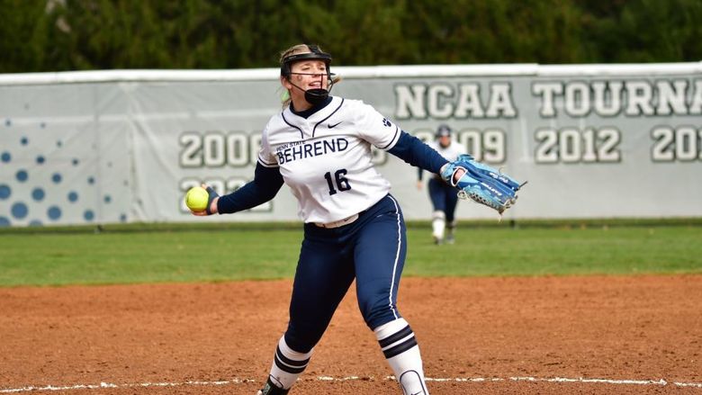 A pitcher for the Penn State Behrend softball team throws the ball.