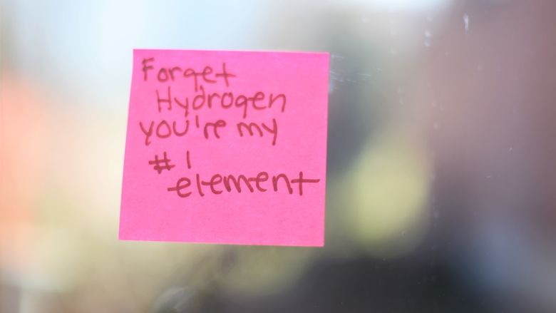 A Post-It note in a breezeway at Penn State Behrend