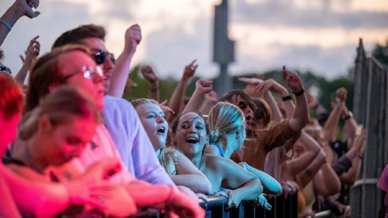 Students in the front row cheer during the Yung Gravy concert at Penn State Behrend.