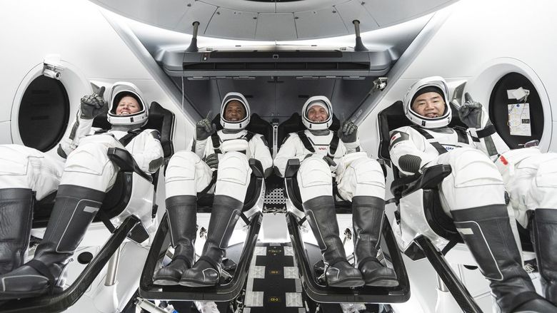 The crew of the SpaceX capsule Resilience prepares to launch on a mission to the International Space Station.