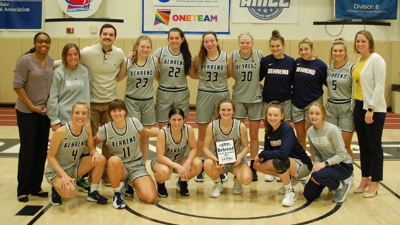 A group photo of the Penn State Behrend women's basketball team, which won the Tip-Off Tournament.