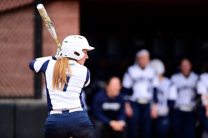 A Penn State Behrend softball player prepares to hit the ball.