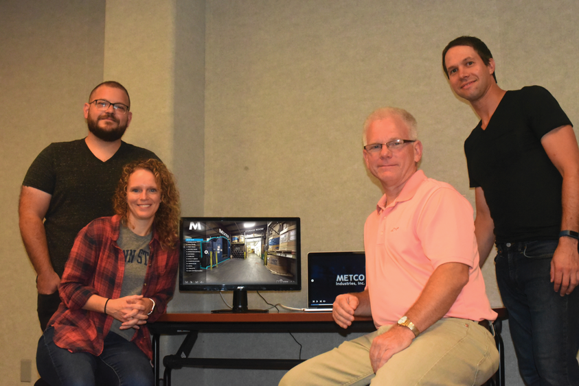 David Perkins, far left, Jodi Herman, and Jaimen Gallo, far right, are three members of Penn State Behrend’s Centers for Teaching and eLearning Initiatives, who recently developed a 360-degree virtual tour of Metco Industries.
