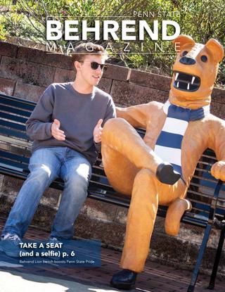 Behrend Magazine - Spring 2020 Cover: John Jarecki, Student Government Association president, sits on the Lion bench at Penn State Behrend.