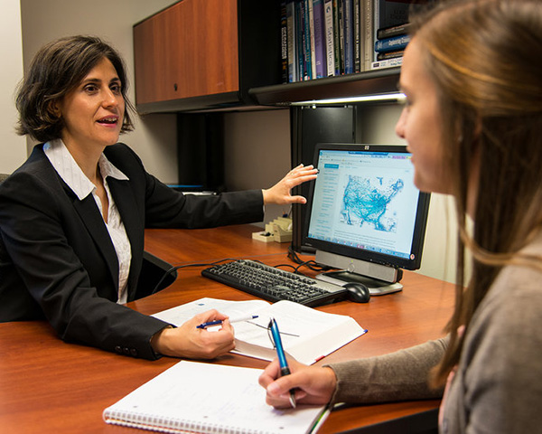 Dr. Ozgun Demirag meeting with a Penn State Behrend MBA student.