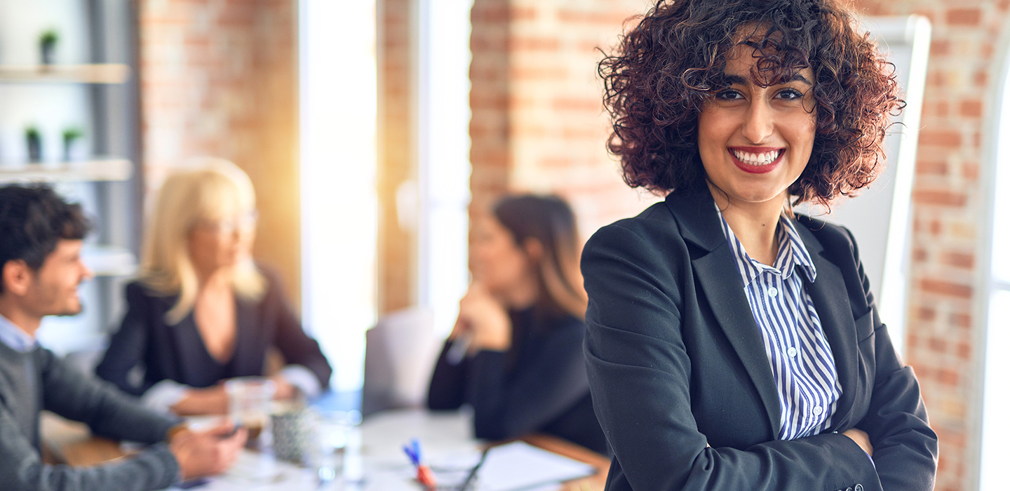 Woman leading a team in an office