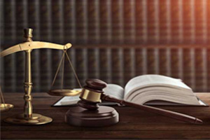A scale, law book, and gavel