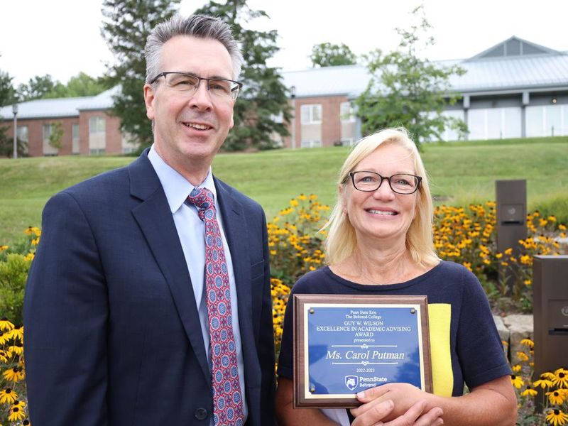 Penn State Behrend Chancellor Ralph Ford poses with Carol Putman, associate teaching professor of management