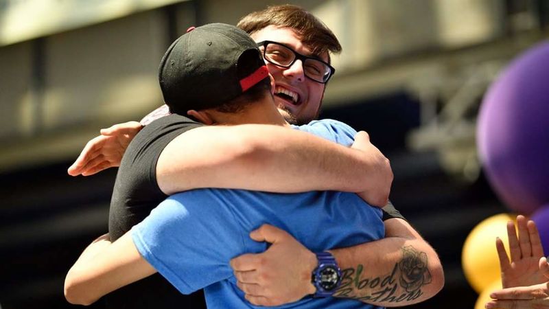 Billy Santoro and Matthew Walker Penn State Behrend student Billy Santoro hugs a guy to whom he has donated bone marrow