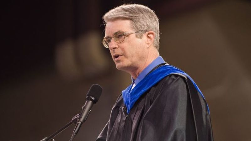 Penn State Behrend professor Jonathan Hall talks during a commencement program.