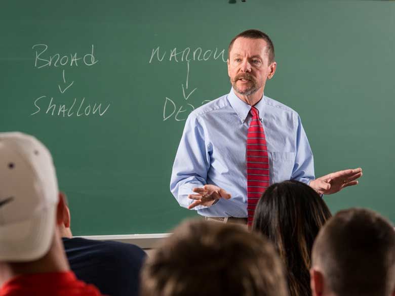 A Penn State Behrend faculty member leads a classroom discussion.