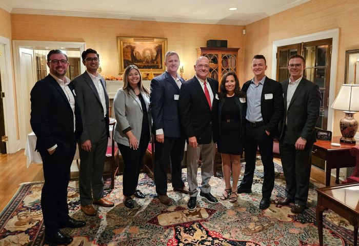 Photo of alumni with Vincent and Joanne Intrieri in Logan House.