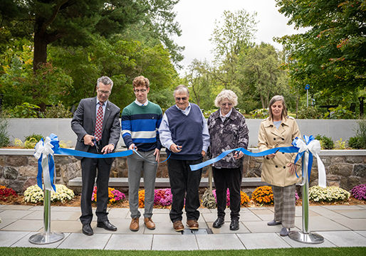 The ribbon cutting for the new Glenhill Gardens on the site of the Behrend's family pool.