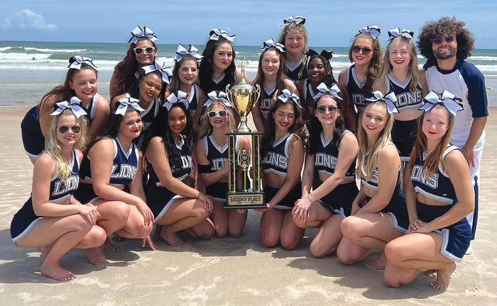 Penn State Behrend’s competitive cheer team recently earned  the college’s first nationally ranked cheerleading trophy.