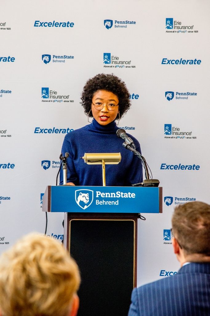 Penn State Behrend student Rebecca Olanrewaju speaks at the podium during a program announcing a $4 million partnership with Erie Insurance Group.