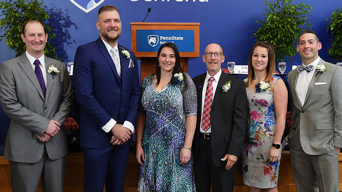 From left, Dustin Fairchild ’08 (swimming), Kevin Buczynski ’08 (basketball), Kristin Macha ’07 (softball), John Fleming ’76 (soccer), Brittany Yost ’07 (water polo), and Anthony Spoto ’08 (water polo)