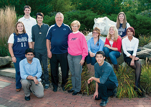 Joe and Isabel Prischak, center, surrounded by several recipients of the scholarships they have endowed at Penn State Behrend.