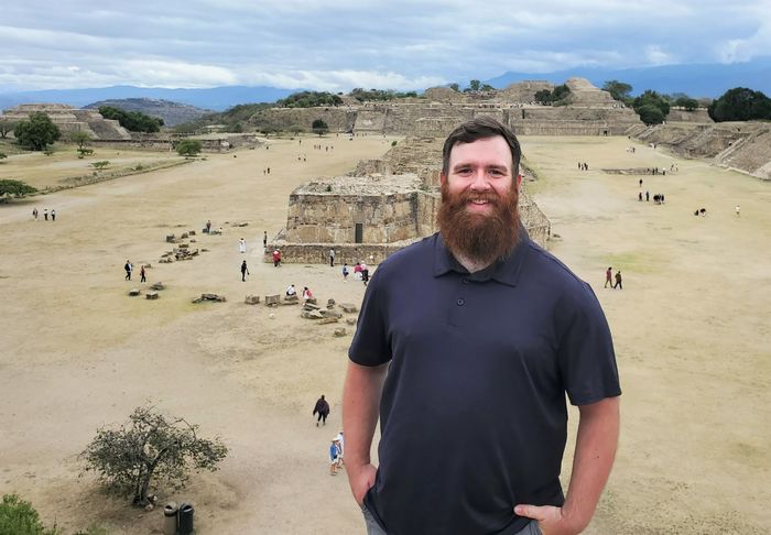 Catlin Lowes, a Penn State Behrend history major, stands near an archeological site in Mexico.