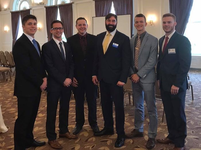 Finance Majors Participate in the CFA Society Pittsburgh Career Fair, From left, Matthew Colpoys, Andrew Hoverson, Nicholas Findley, Jason Pettner (president), Vilyamir Kolesnichenko, and Max Morrow.