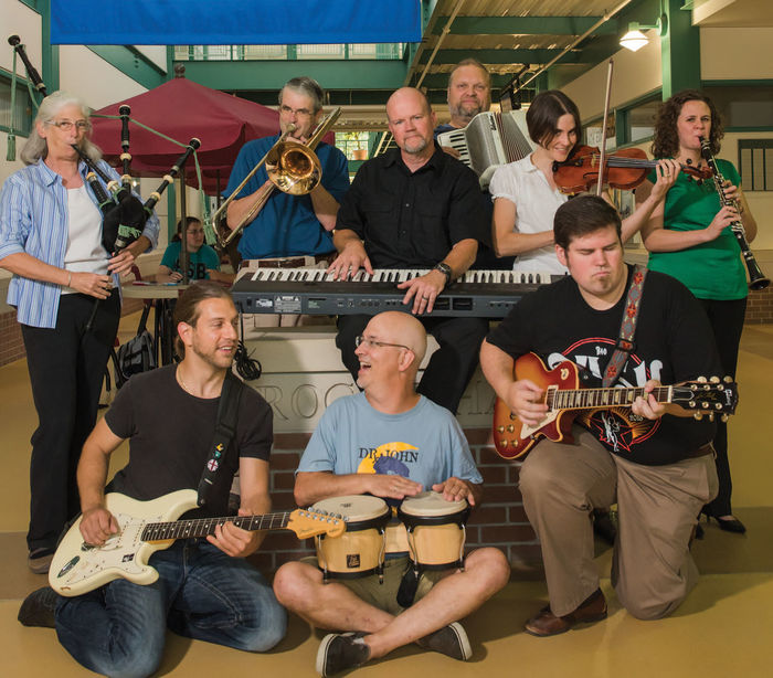 Musically-inclined members of the School of Science faculty include, first row, from left, Dr. Daniel Galiffa, Dr. John Steffen, and Peter Olzewski, standing in back, from left, Dr. Pam Silver, Jonathan Hall, Dr. Michael Justik, Paul Olson, Dr. Lauren Falco, and Jodie Styers.