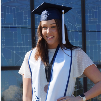 Photo of woman wearing graduation cap