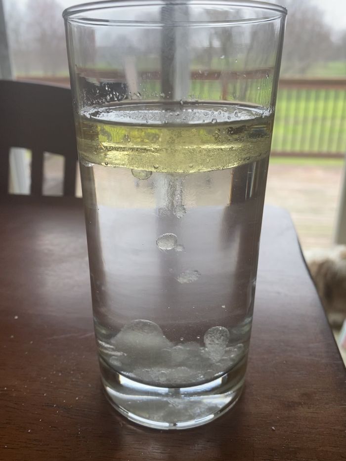 Oil in Water experiment in clear glass