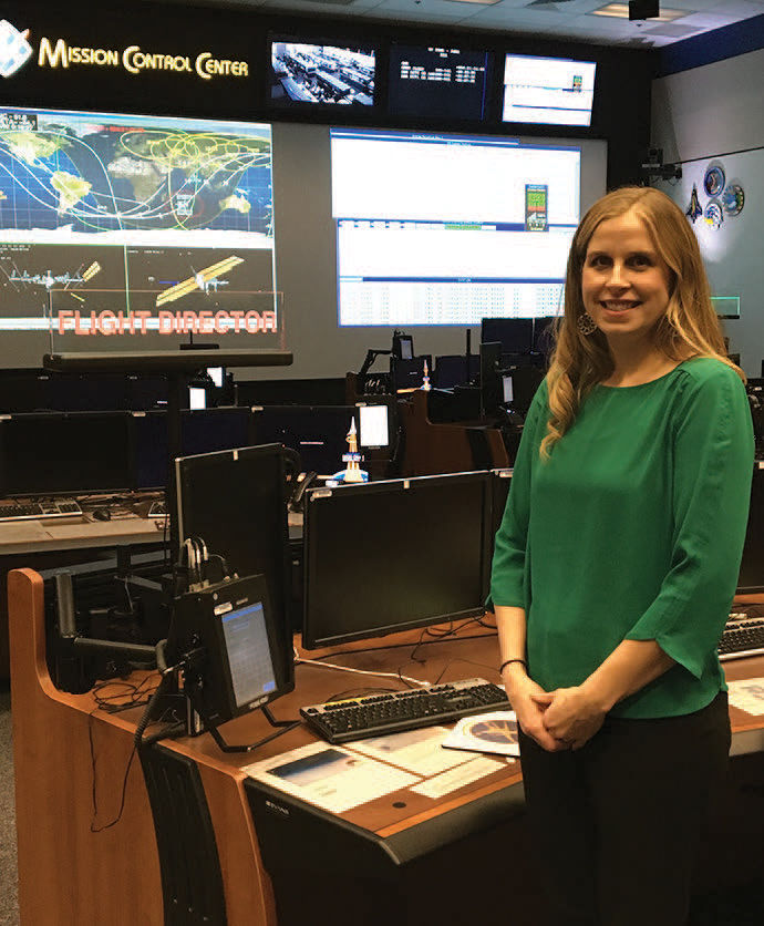 Mary Lawrence ‘01 in the mission control center at NASA in Houston.