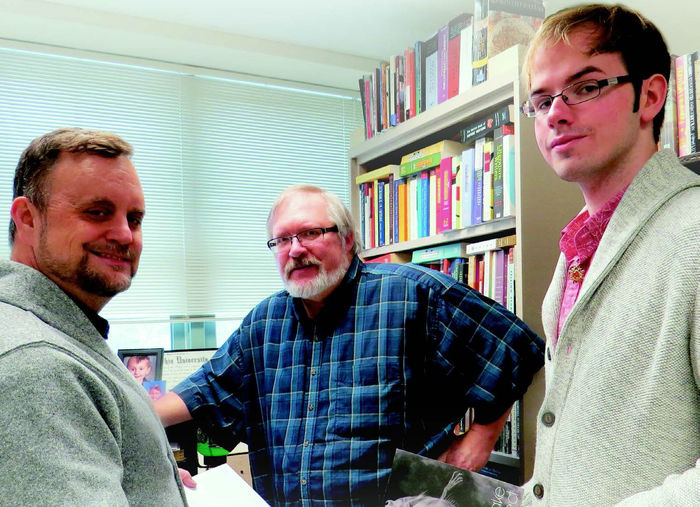Dr. Tom Noyes, George Looney, and Ben Gauge, a Creative Writing major