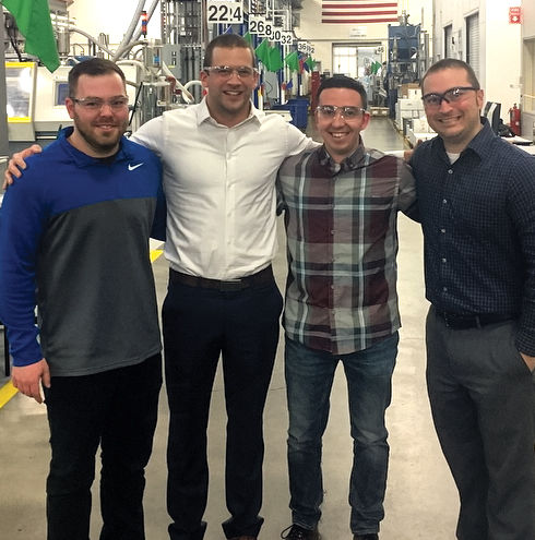 Plastics Engineering Technology graduates, from left, Kevin Backoefer ’14, Michael Wiseman ’05, Chris Desmond ’13, and David Smith ’11, work together at ARC Group in Colorado.