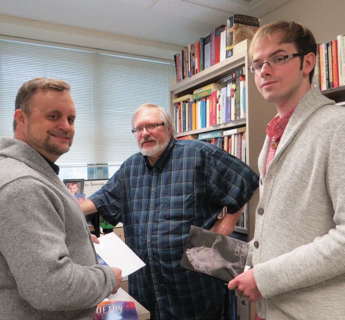 From left: Dr. Tom Noyes, George Looney, and Creative Writing major Ben Gauge.