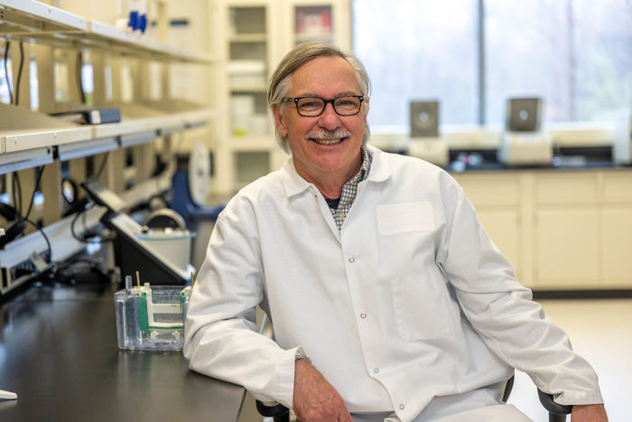 A portrait of Ivor Knight, director of the Biomedical Translational Research Center at Penn State Behrend, in the college's new biomedical research lab.