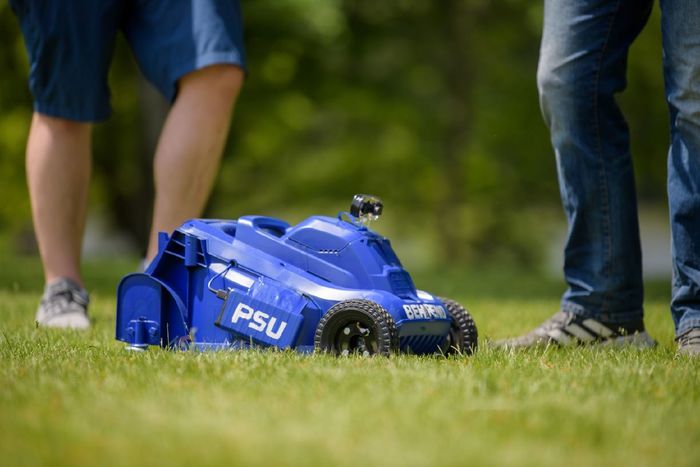 A close-up of a remote-control lawn mower built by students at Penn State Behrend.