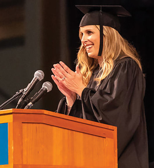Mary (Good) Lawrence, pictured here giving the college’s 2019 spring commencement speech, was recently chosen to receive the Behrend Distinguished Alumni Achievement Award.