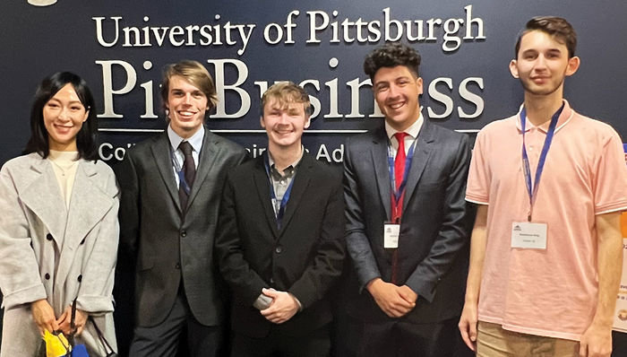Dr. Ying Cao, assistant professor of project and supply chain management, left, poses with the team of Behrend students that took second place in the Race to the Case competition at the University of Pittsburgh. With Cao, from left, Chris Annear, Joshua McGee, Aaron Kovatch, and Matthew King.