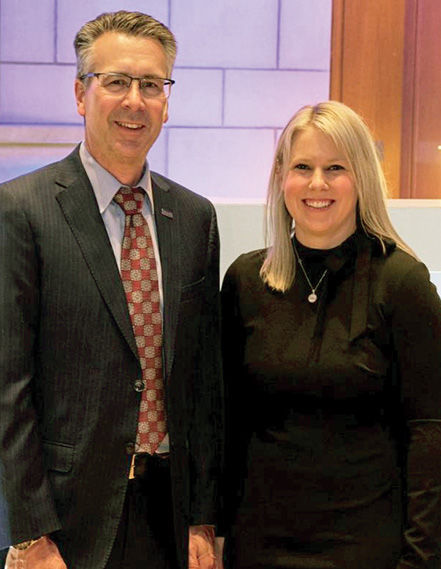 Nicole (Frisbee) Gailey, pictured here with Chancellor Ralph Ford, was recently honored as one of seven Penn State Alumni Achievement Award recipients.