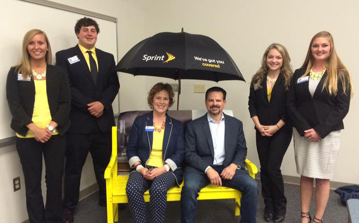 Students in Dr. Mary Beth Pinto’s MKTG 344 Buyer Behavior class competed to create guerrilla marketing plans for Sprint. The winning team, “We’ve Got You Covered”— Shelby Lunz, Becker Nezballa, Nicole Krahe, and Britnee Terrill—are pictured with Pinto and Marc Nachman, regional president for Sprint.