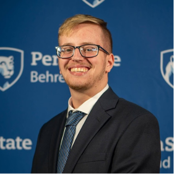 Photo of Tim Keen with Penn State Behrend backdrop