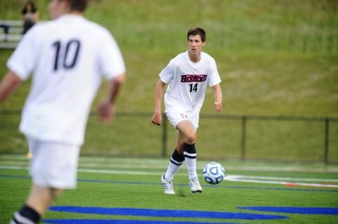 Senior Eric Hackworth looks to pass during a Penn State Behrend soccer game. 