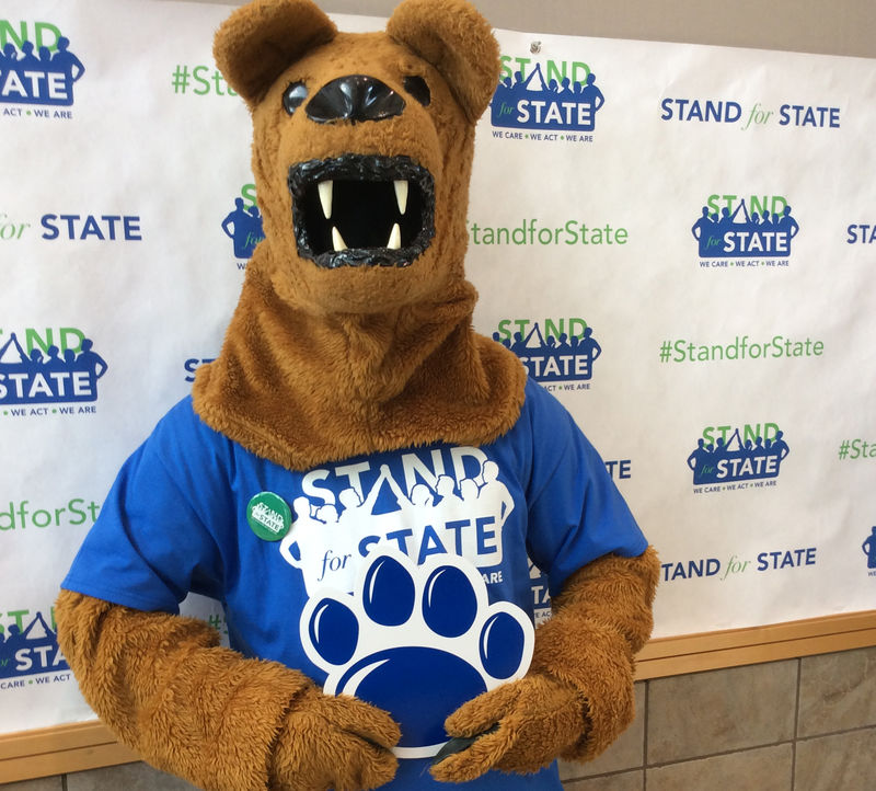 The Nittany Lion mascot wearing a Stand for State T-shirt