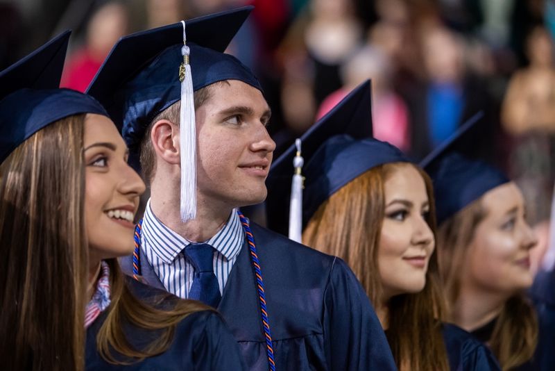 Students sit at Penn State Behrend's spring commencement ceremony.