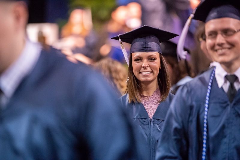 A close-up of a student at Penn State Behrend's spring commencement ceremony.