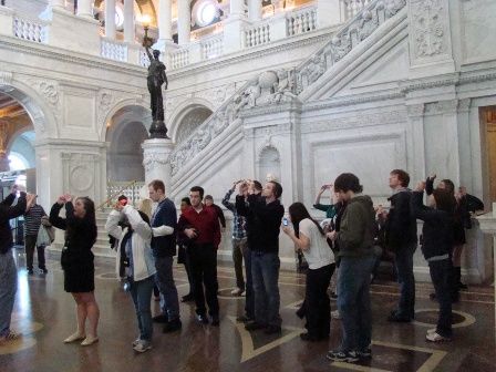 Students look up at the Library of Congress