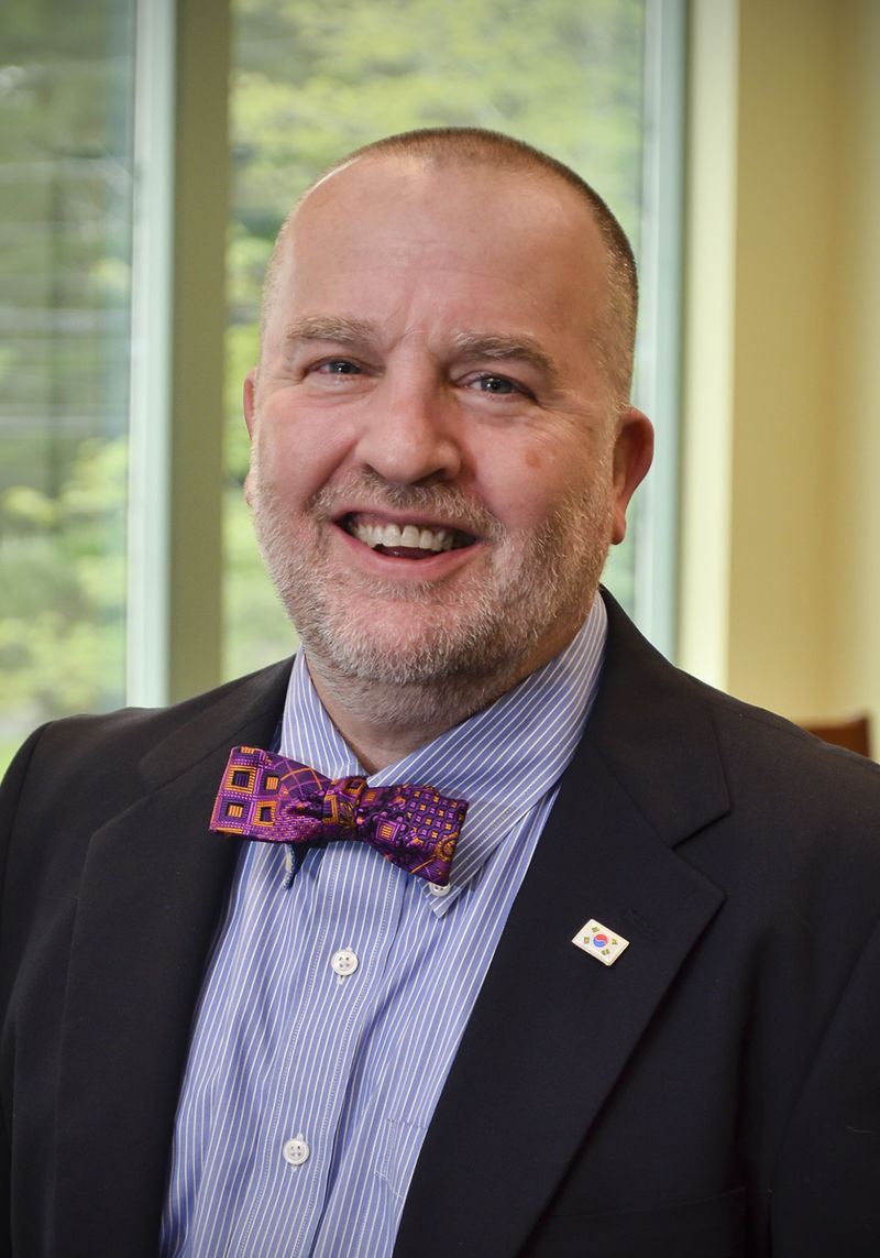 A portrait of Eric W. Corty, director of the School of Humanities and Social Sciences at Penn State Behrend.