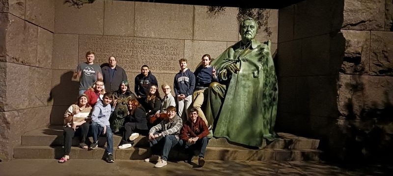 Group of students at FDR Memorial with Fala the Scottish Terrier