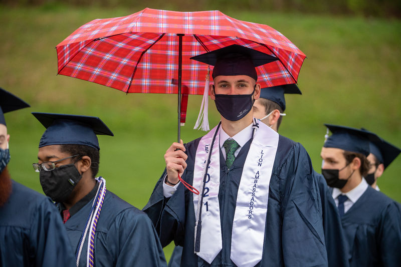 Penn State Behrend graduates line up to enter the stadium for the 2021 spring commencement.