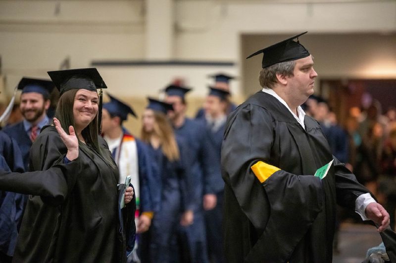 New graduates enter Junker Center at the start of Penn State Behrend's fall 2022 commencement.